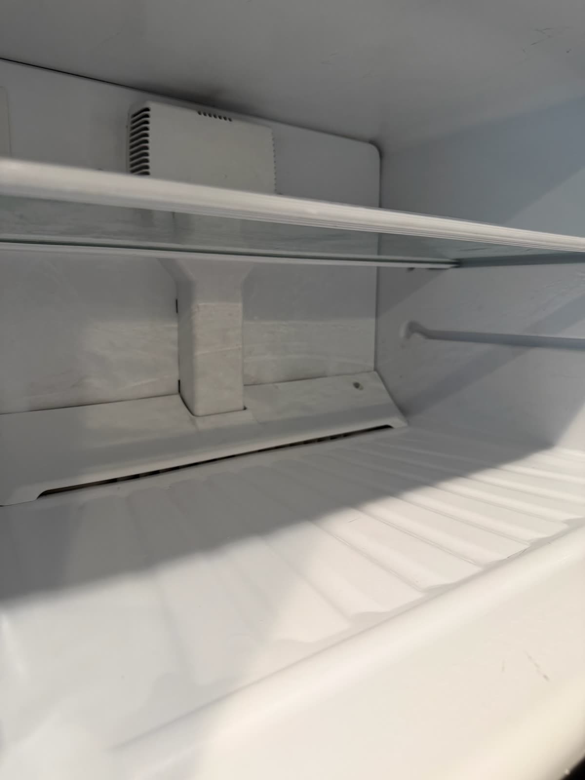 Clean refrigerator interior with spills removed